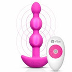 Фото анальной малиновой вибропробки b-Vibe Triplet с пультом